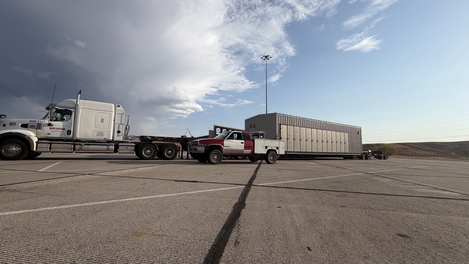Orton Diesel service truck beside a heavy haul truck and trailer